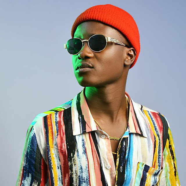 Ozee performing live in Nigeria, Ozee Mark Time EP cover, Ozee Afro-Fusion singer